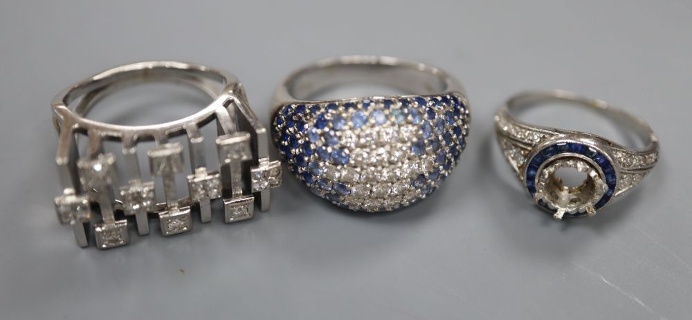3 x assorted gem set rings.